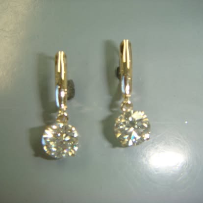 Diamond drop earrings on gold lever backs