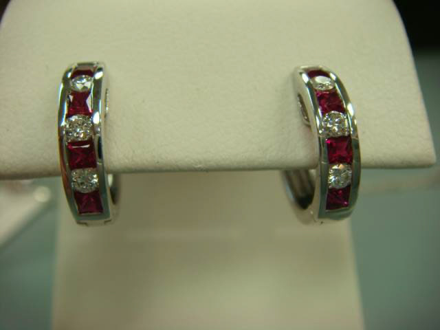 White gold huggie earrings with channel-set rubies and diamonds