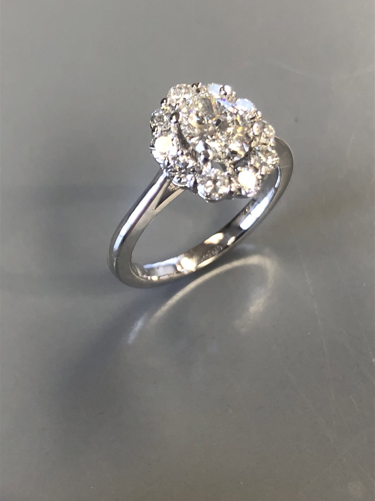 White gold diamond cluster engagement ring