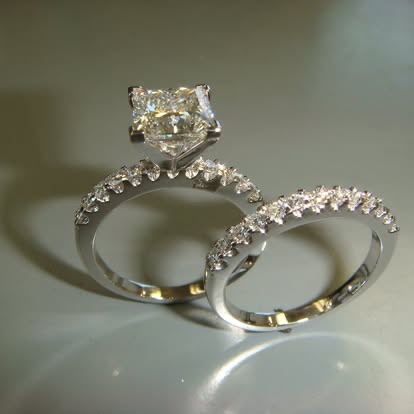 White gold diamond engagement ring with a matching pavé band