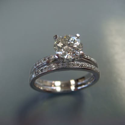 White gold diamond engagement ring with a matching pavé band