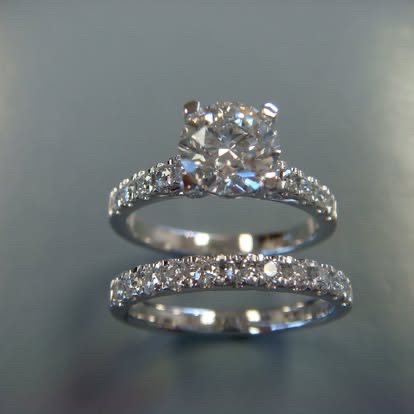 White gold diamond engagement ring with a matching pavé band