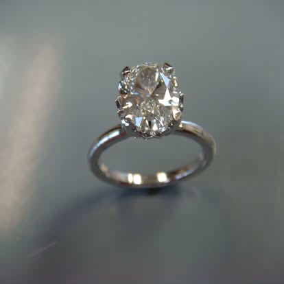 White gold oval diamond solitaire
