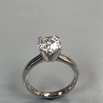 White gold round diamond solitaire in a six-prong setting