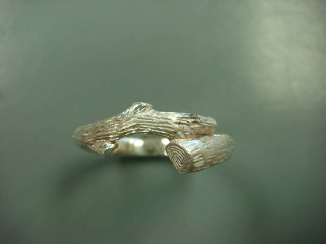 Handmade gold band shaped like a branch