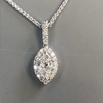 Marquise diamond pendant with a pavé bail in white gold