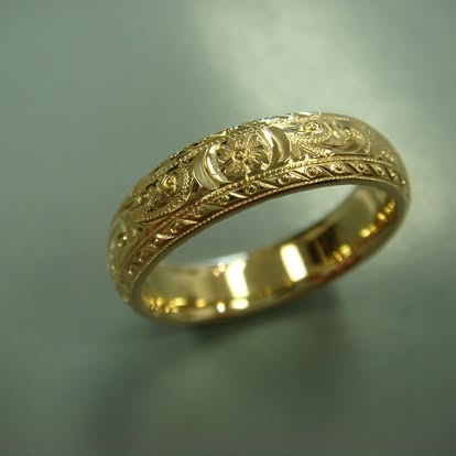 Hand-engraved yellow gold wedding band