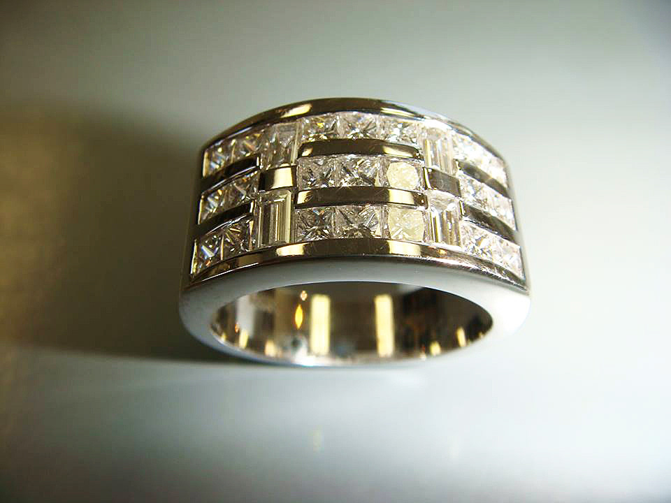 Men's wide white gold band with channel-set baguette and square diamonds