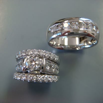 Stacked white gold wedding bands with channel-set diamonds