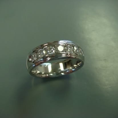 White gold band with channel-set diamonds
